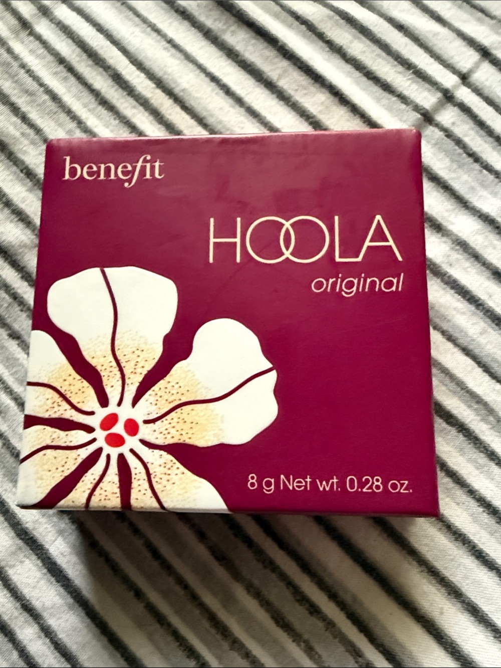 Benefit Hoola Bronzer - Plum Packaging with White Floral Accent